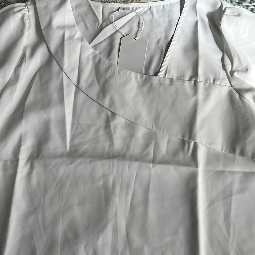Lightweight asymmetrical neckline blouse